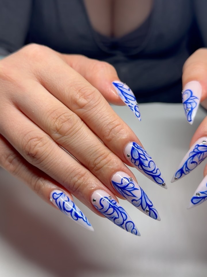 Teal leopard print ombre nails on almond and stiletto shapes
